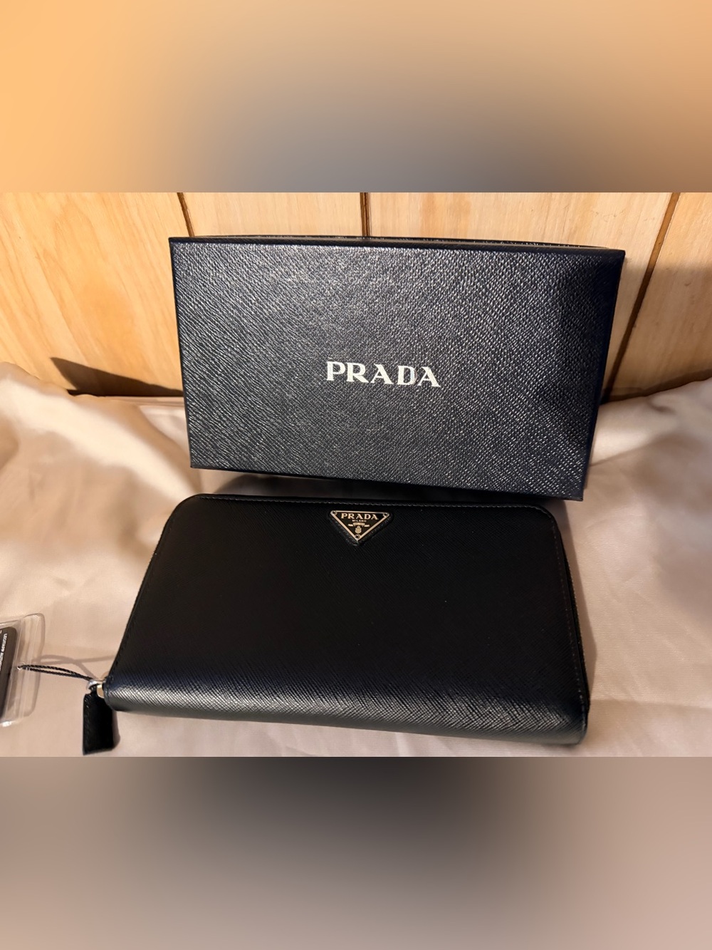 Prada Black Saffiano Zip Wallet with Silver Logo